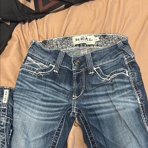 Ariat Blue Boot Cut Jeans with Distressed Detailing